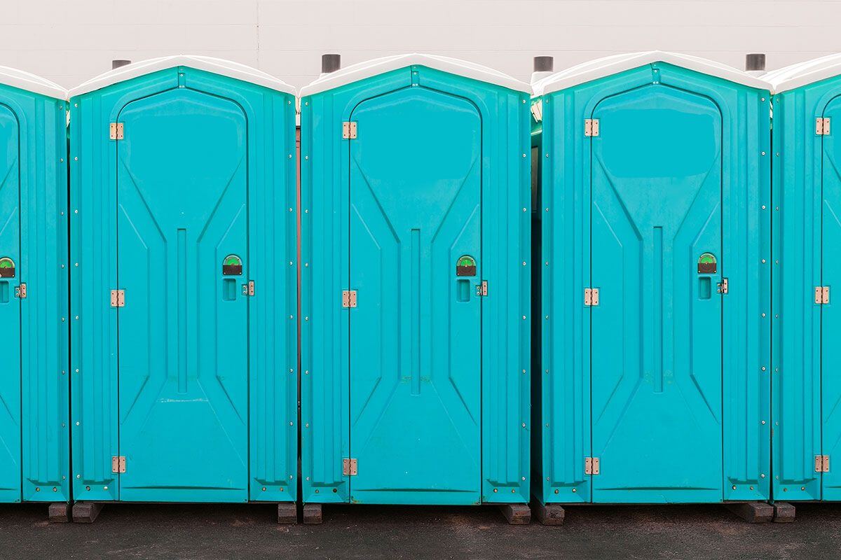 Industrial portable restroom units at a plant in Yelm, Washington